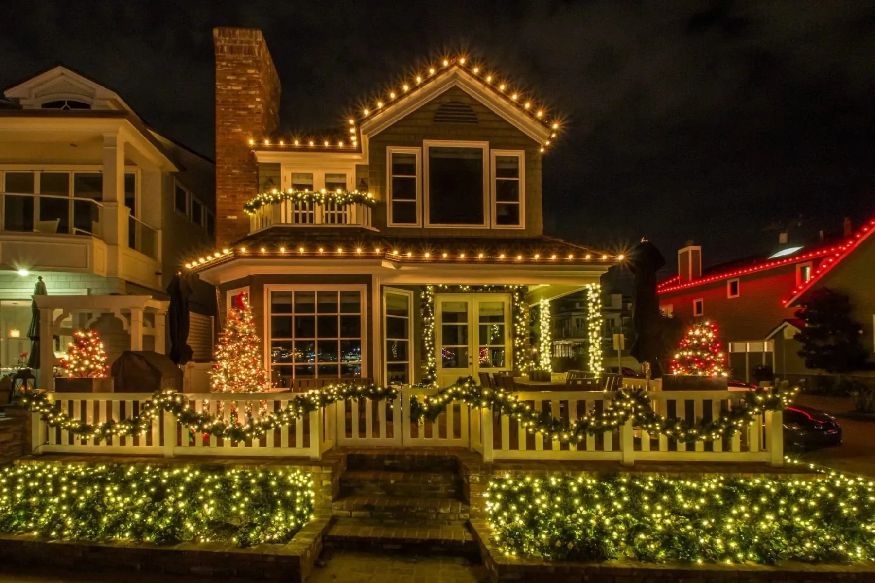 Roofline and walkway Christmas lighting installed by Watson Landscaping Services