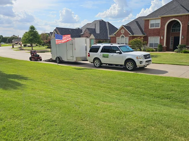 Watson Landscaping truck and trailer parked at a North Fort Worth job