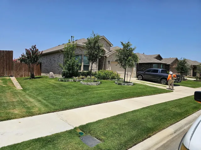 Front lawn and beds serviced in a Saginaw TX subdivision
