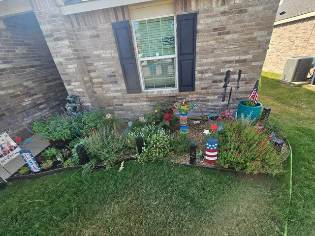 Foundation bed planted with seasonal color and mulch