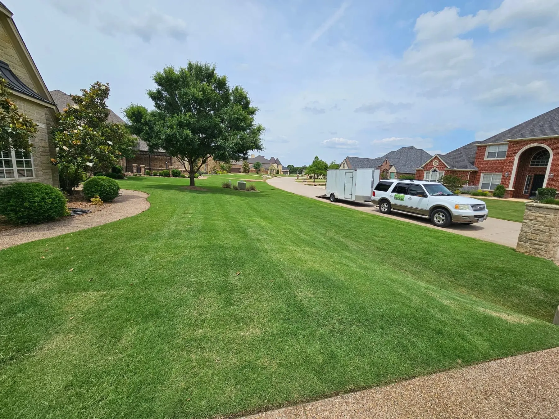 Striped front lawn mowed by Watson Landscaping Services